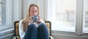 Woman relaxing with a cup of coffee