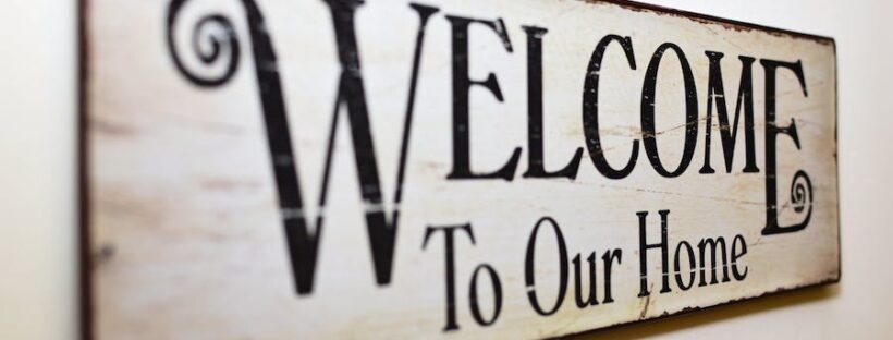 Sign on sober living house 'Welcome To Our Home'.